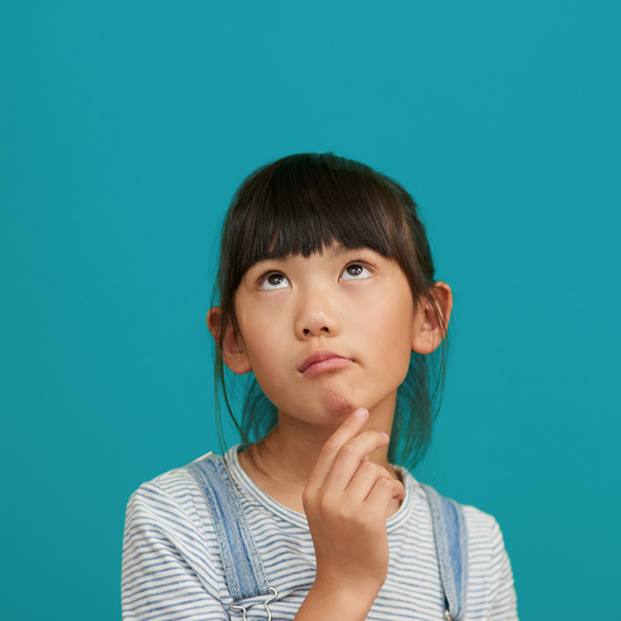 Middle school girl with her hand on her chin thinking